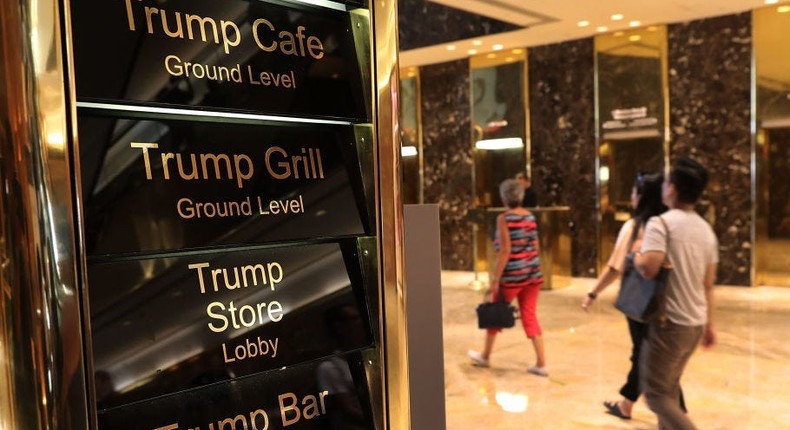 People walk through Trump Tower on Fifth Avenue in Manhattan on August 24, 2018 in New York City.