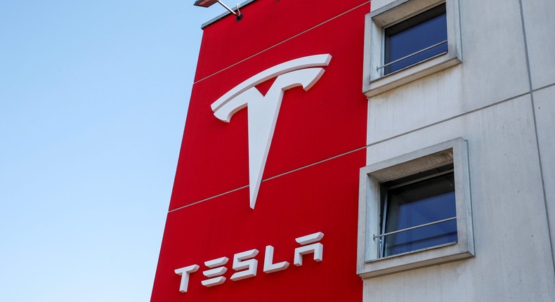 Logo of Tesla is seen at a branch office in Bern