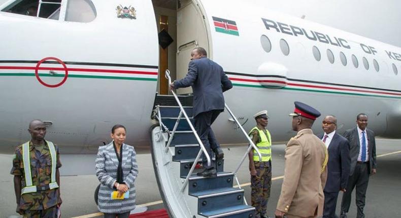 President Uhuru Kenyatta boarding a plane. 