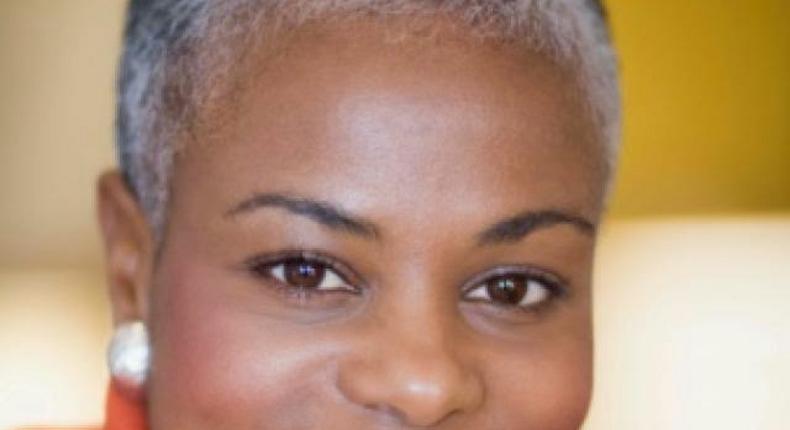 Black woman with short gray hair