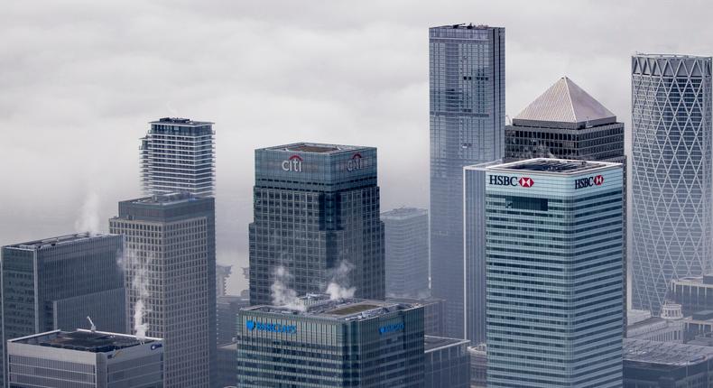 Fog shrouds the Canary Wharf business district including global financial institutions Citigroup Inc., State Street Corp., Barclays Plc, HSBC Holdings Plc and the commercial office block No. 1 Canada Square, on the Isle of Dogs on November 05, 2020 in London, England.
