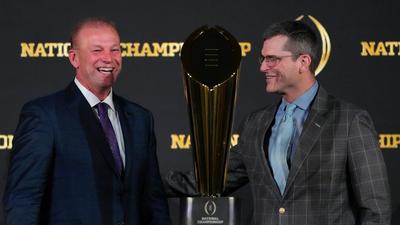 Head coaches Kalen DeBoer (left) and Jim Harbaugh are leading their teams to face each other on Monday night.David J. Phillip/AP