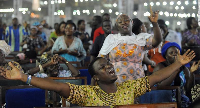 Church members pray