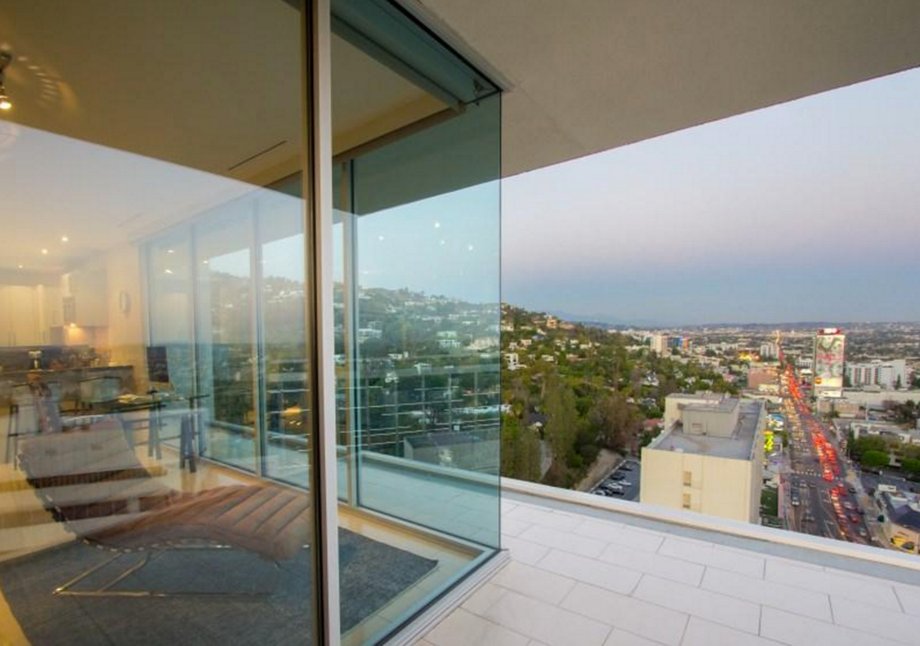 A terrace expands off of the condo.