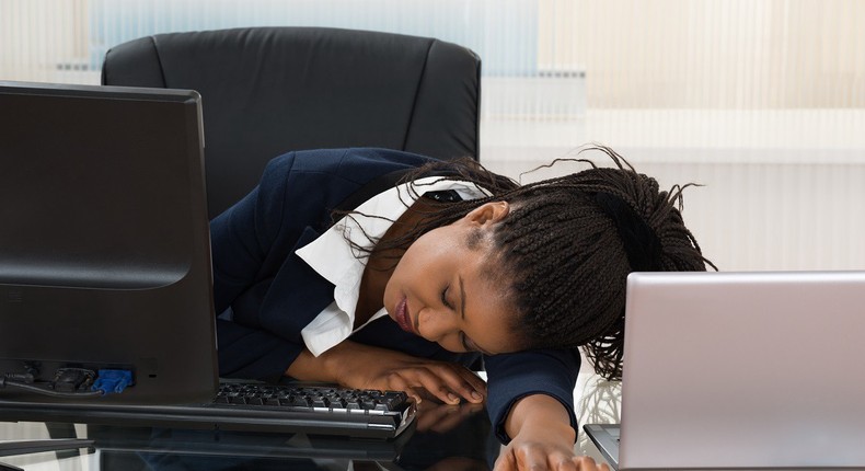 Tired woman at work(Medium)