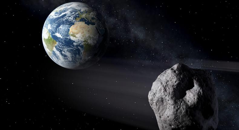 Illustration d'astéroïdes passant à proximité de la Terre. Peter Carril/ESA