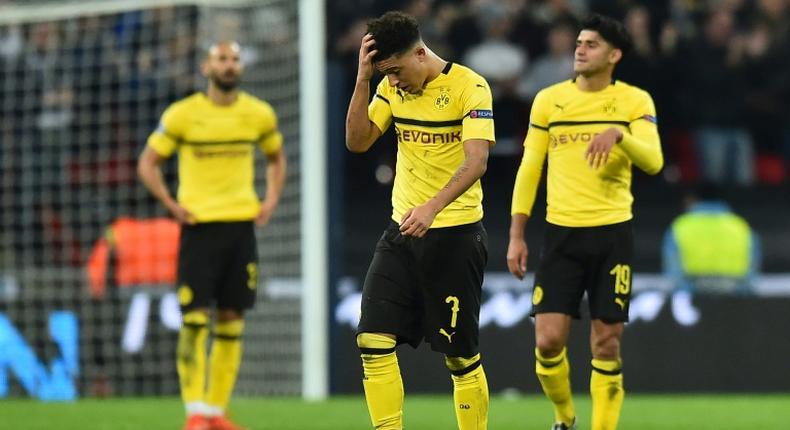 England winger Jadon Sancho (C) looks shellshocked after Dortmund's 3-0 first-leg defeat by Tottenham