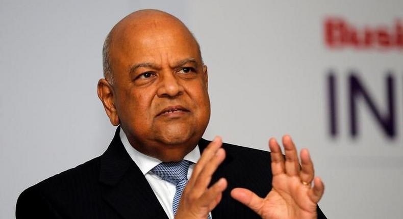 Finance Minister Pravin Gordhan gestures during his address at a business summit in Sandton, South Africa, September 13, 2016. 