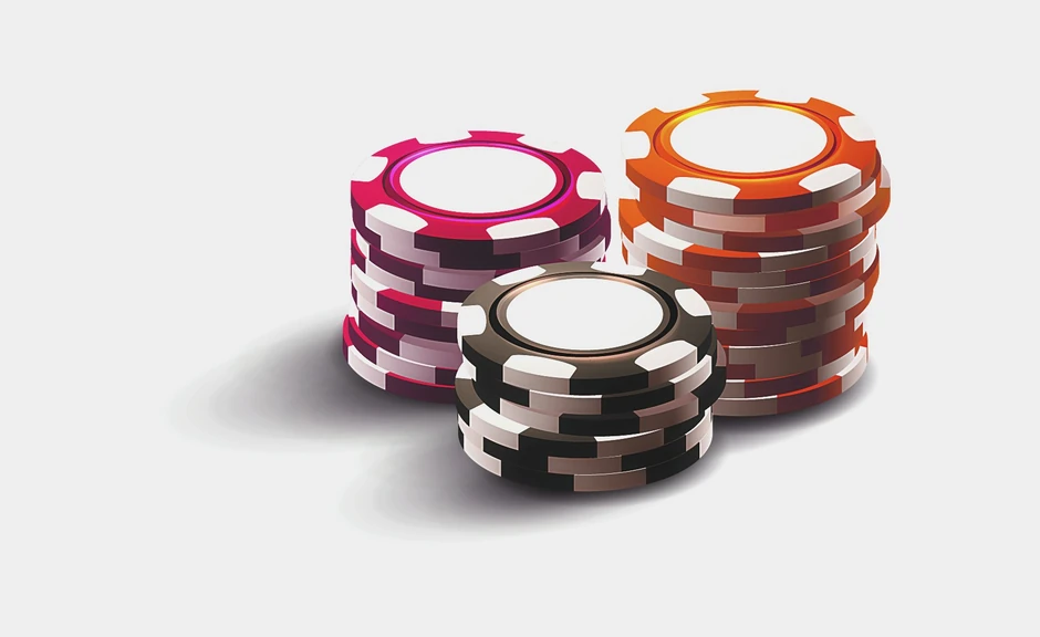 Šareni žetoni koje guta uski prorez ruletskog stola u kockarnicama