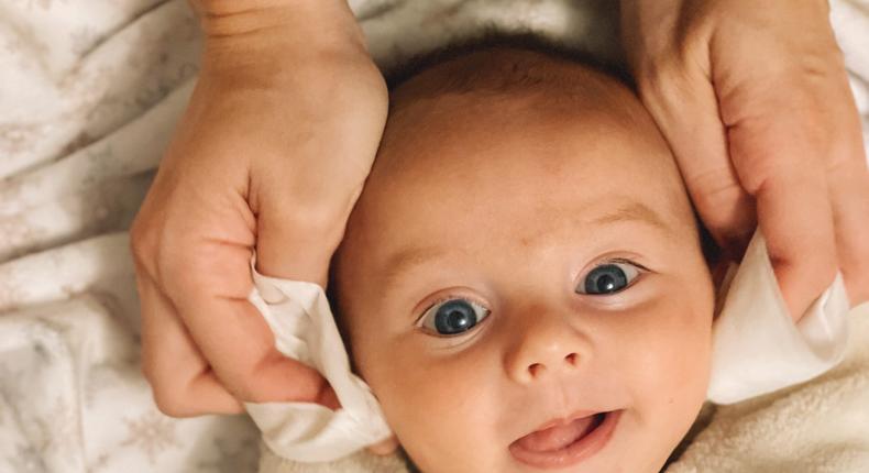 Arlo McDaid enjoys a baby facial before he nods off.Sarah McDaid