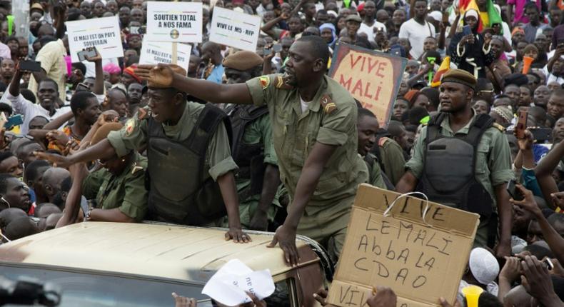 Malian demonstrators on Friday hailed soldiers for the military overthrow of President Ibrahim Boubacar Keita