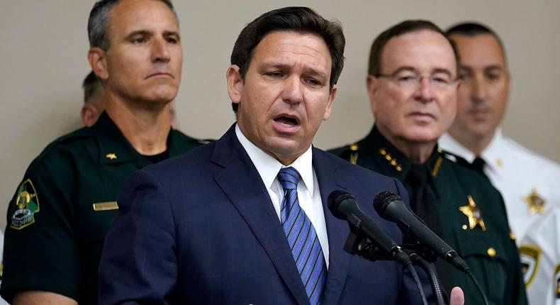 Florida Gov. Ron DeSantis gestures as he speaks during a news conference Thursday, Aug. 4, 2022, in Tampa, Florida. DeSantis announced that he was suspending State Attorney Andrew Warren, of the 13th Judicial Circuit, due to neglect of duty.