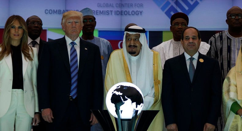 President Donald Trump and Saudi King Salman pose for photos after a ceremony to mark the opening of the Global Center for Combatting Extremist Ideology, in Riyadh, May 21, 2017.