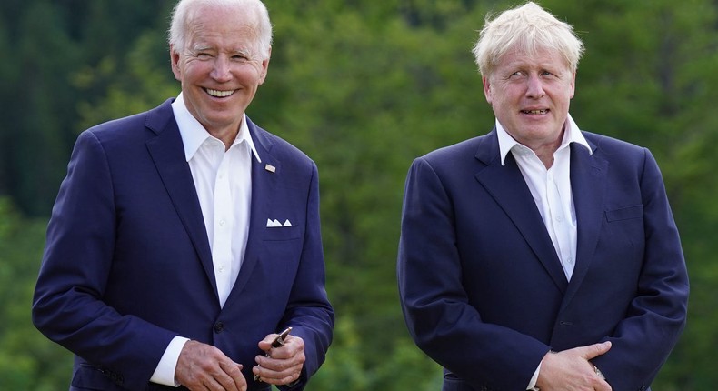 US President Joe Biden and British Prime Minister Boris Johnson attend the G7 group photo on the first day of the G7 summit at Schloss Elmau on June 26, 2022 near Garmisch-Partenkirchen, Germany.