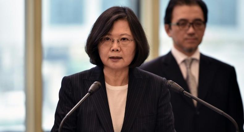 Taiwan President Tsai Ing-wen (left) speaks before departing from Taoyuan airport on January 7, 2017
