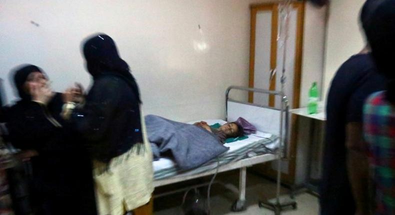 An injured child lies on a bed at a hospital in Syria’s northeastern city of Hassakeh