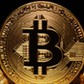 Golden Bitcoin Coin and mound of gold on black background