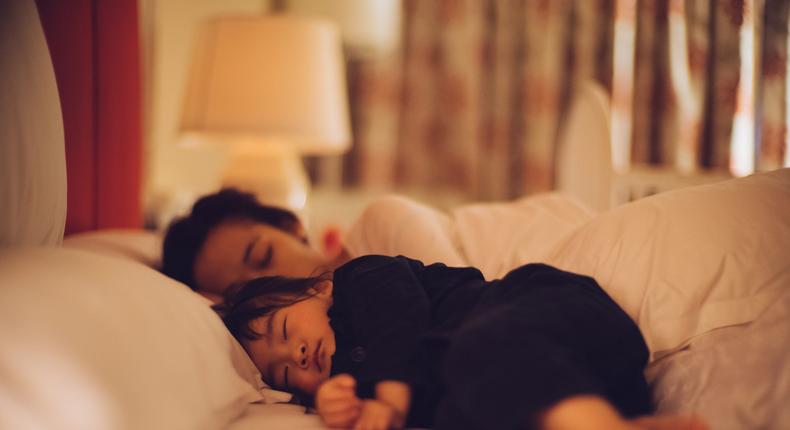 The author co-sleeps with her toddler and says the whole family gets more rest this way.Tang Ming Tung/Getty Images