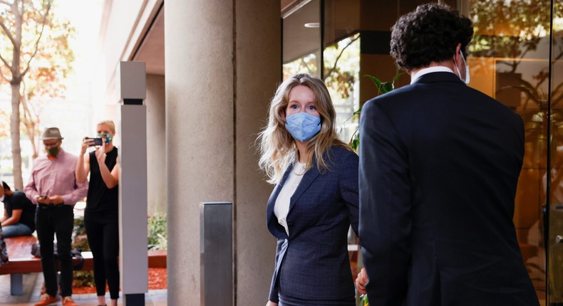 Theranos founder Elizabeth Holmes and her partner Billy Evans leaves the Robert F. Peckham U.S. Courthouse after the delivery of opening arguments in her trial, in San Jose, California, U.S., September 8, 2021.
