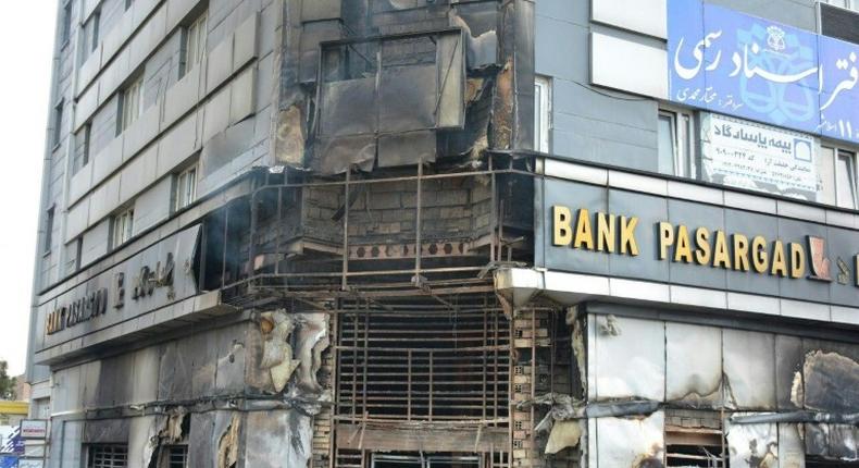 A scorched branch of the Pasargad bank, which was set ablaze by protesters, is seen in November 2019 in Eslamshahr, near the Iranian capital Tehran