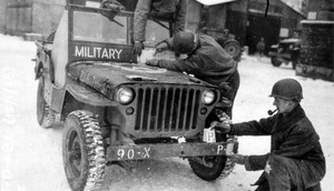 This photo provided by the Ghost Army Legacy Project shows a Jeep getting new bumper markings for special effects For decades, their mission during World War II was a secret.National Archives/Ghost Army Legacy Project via AP