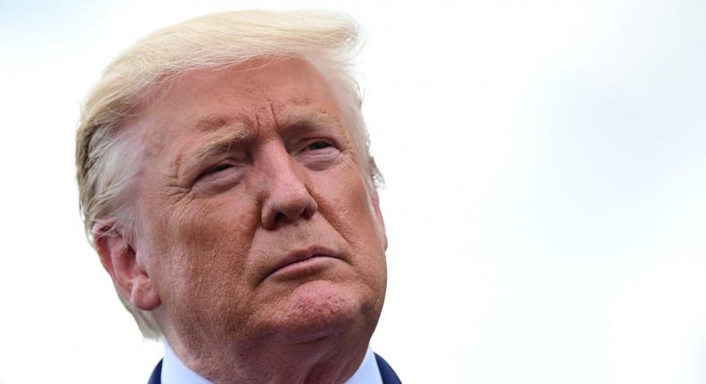 FILE PHOTO - U.S. President Donald Trump speaks to reporters as he departs for travel to North Carolina from the White House in Washington, U.S., September 9, 2019. REUTERS/Erin Scott