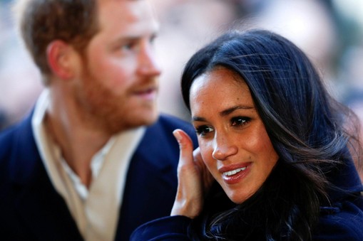 Britain's Prince Harry and his fiancee Meghan Markle arrive at an event in Nottingham