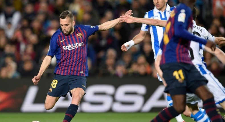 Jordi Alba's goal gave Barcelona a 2-1 win over Real Sociedad on Saturday