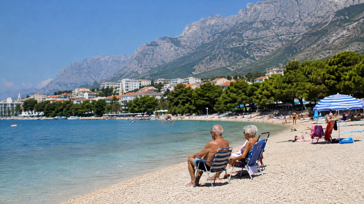 Stariji par na plaži - ilustracija