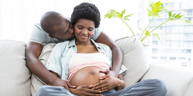 Pregnant woman and her husband