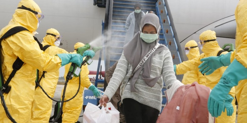 Travelers in and out of China have to pass a series of health tests (Reuters)