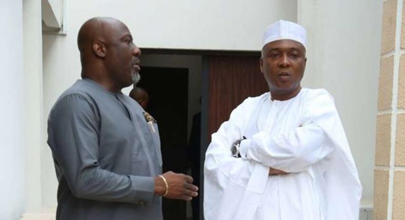 Dino Melaye (left) and the Senate President Bukola Saraki