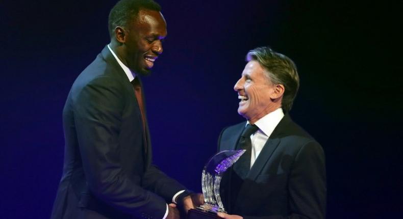 World athletics chief Sebastian Coe (R) has thrown his support behind a new team event spearheaded by Usain Bolt, pictured together during the 2016 International Association of Athletics Federations gala