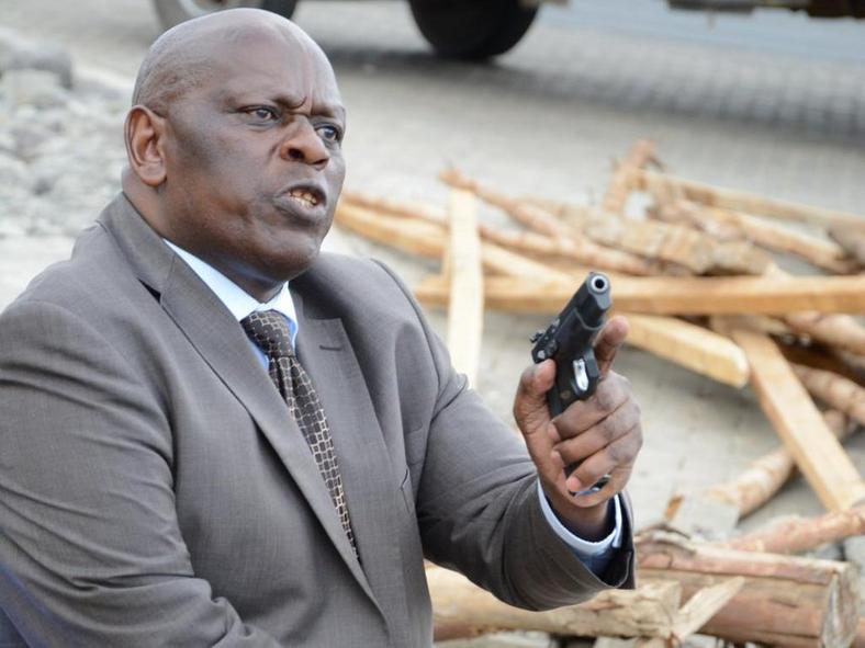 Former Senator Paul Njoroge wielding his gun during the altercation with Polycarp Igathe 