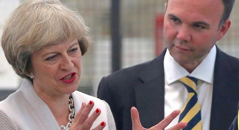 Britain's Prime Minister Theresa May and Croydon Central MP Gavin Barwell.