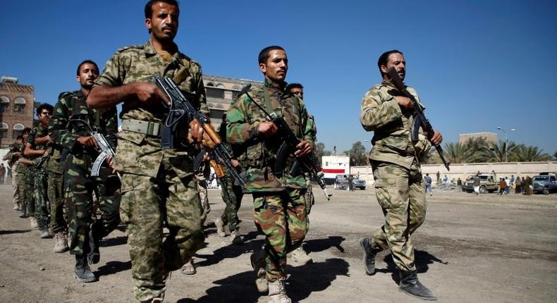 Huthi rebels parade during a gathering in the capital Sanaa to mobilize more fighters to battlefronts to fight pro-government forces in other Yemeni cities, on January 1, 2017