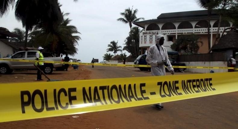 A police cordon is seen while Ivorian police prepare to inspect the area of the hotel Etoile du Sud following an attack by gunmen from al Qaeda's North African branch, in Grand Bassam, Ivory Coast, March 14, 2016. 