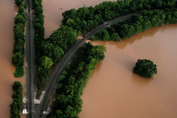 Railway lines are seen surrounded by flood waters caused by Tropical Storm Harvey near Sandy Point