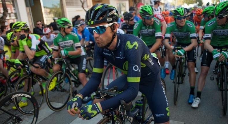 Movistar's Spanish cyclist Alejandro Valverde sits on his bicycle prior to riding in the first stage of the Ruta del Sol tour, a 155 km ride from Rincon de la Victoria to Granada on February 15, 2017