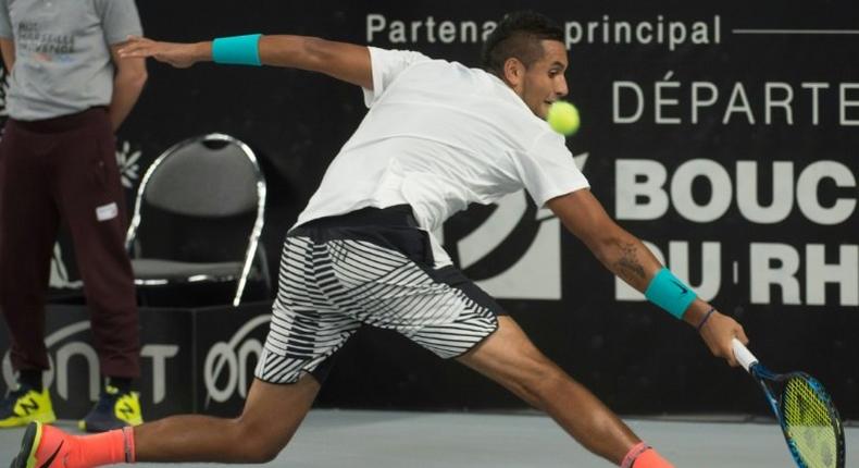 Australia's Nick Kyrgios returns the ball to Slovakia's Norbert Gombos during their ATP Marseille Open tennis match in Marseille, southern France, on February 24, 2017