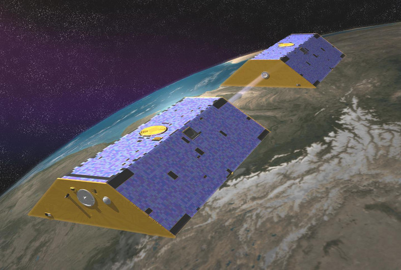 Wizja artystyczna satelitów GRACE na orbicie