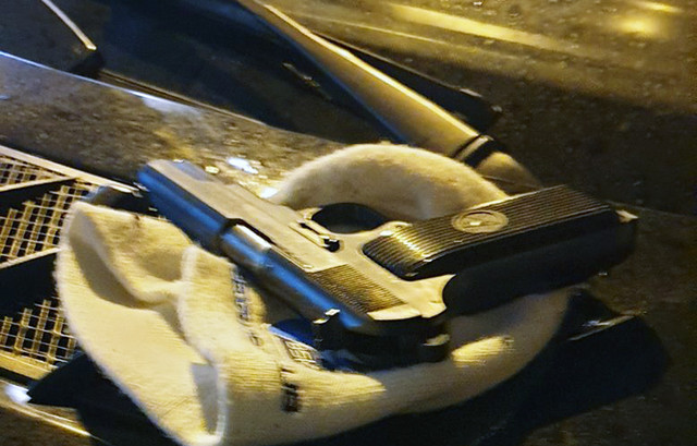 A pistol found at the scene of the shooting.