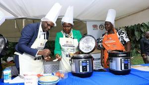 Minister Ruth Nankabirwa (C) launched the clean cooking programme this week