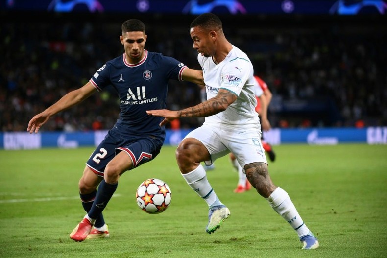 Paris Saint-Germain full-back Achraf Hakimi (L) scored the first goal as Morocco trounced Guinea-Bissau 5-0 in a World Cup qualifier