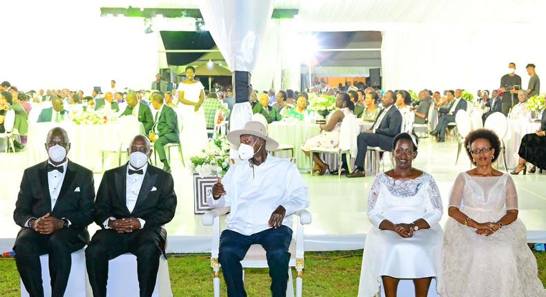 Museveni poses for a photo with Atwiine and her husband