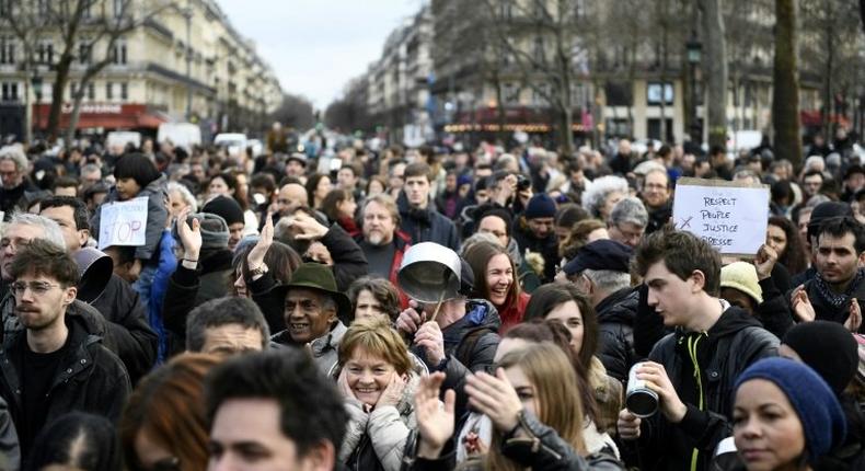 Demonstrators, some making noise with saucepans, have staged protests against conservative candidate Francois Fillon