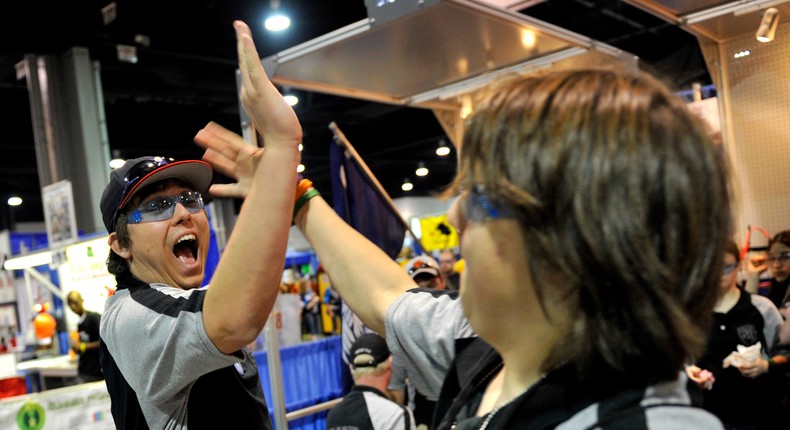 High school students participating in a robotics competition.