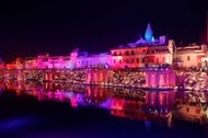 Participants light earthen oil lamps on the banks of the Sarayu river in an attempt to enter the Gui