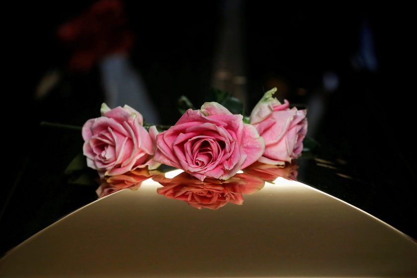 Flowers are seen on the casket of the late singer Aretha Franklin as it is laid to rest at her buria