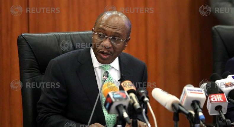 Nigeria's Central Bank Governor Godwin Emefiele speaks during the monthly Monetary Policy Committee meeting in Abuja, Nigeria May 22, 2018. 